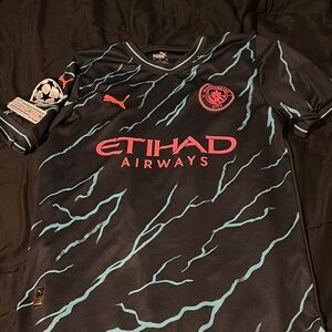 Puma Kids Black and Blue Manchester City Shirt